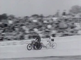 Cycling races behind large motorcycles